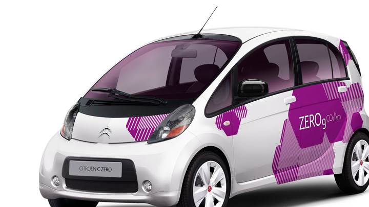 Citroen C-Zero Front Side Pose In White N Purple Designing